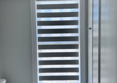 condo washroom zebra blinds